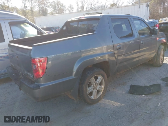 2010 Honda Ridgeline RTL with VIN 5FPYK1F52AB004678, listed as a IAAI auction lot 41661968 with 169,021 mi miles. Bid and sale history available at carsss.com. Image 4.