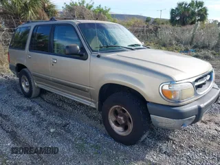 1999 Ford Explorer z VIN 1FMZU32X7XUB01672, wystawiony jako IAAI lot #41263264 z przebiegiem 148 134 mil mil oraz . Historia ofert i sprzedaży dostępna na DreamBid. Obrazek 1.