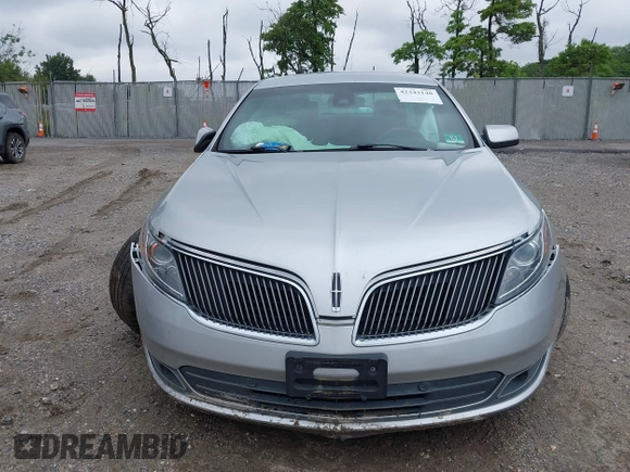 2013 Lincoln MKS with VIN 1LNHL9DK4DG606551, listed as a IAAI auction lot 42343140 with 70,424 mi miles and . Bid and sale history available at DreamBid. Image 12.