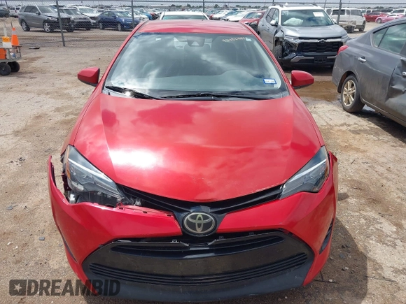 2018 Toyota Corolla L z VIN 5YFBURHE6JP755257, wystawiony jako IAAI lot #42155481 z przebiegiem 79 138 mil mil oraz . Historia ofert i sprzedaży dostępna na DreamBid. Obrazek 13.