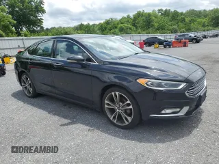 2017 Ford Fusion Titanium z VIN 3FA6P0K92HR192881, wystawiony jako Copart lot #61190515 z przebiegiem 109 834 mil mil oraz Szkoda całkowita • Salvage title. Historia ofert i sprzedaży dostępna na DreamBid. Obrazek 4.