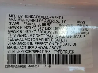 2023 Honda Ridgeline RTL-E with VIN 5FPYK3F76PB011963, listed as a Copart auction lot 63079165 with 25,658 mi miles and Salvage title. Bid and sale history available at DreamBid. Image 12.