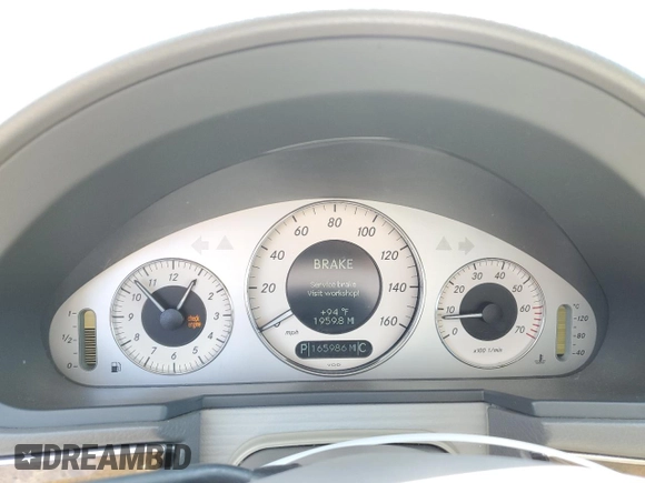2004 Mercedes-Benz E-Class 5.0L with VIN WDBUF70JX4A479530, listed as a Copart auction lot 68093214 with 165,986 mi miles and Clean Title. Bid and sale history available at carsss.com. Image 9.