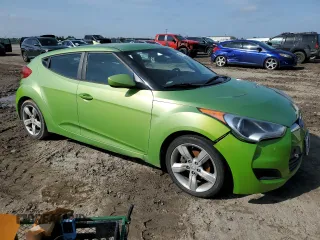 2012 Hyundai Veloster w/Gray Int z VIN KMHTC6AD1CU066882, wystawiony jako Copart lot #55781745 z przebiegiem 167 427 mil mil oraz Czysty tytuł • Clean title. Historia ofert i sprzedaży dostępna na DreamBid. Obrazek 4.