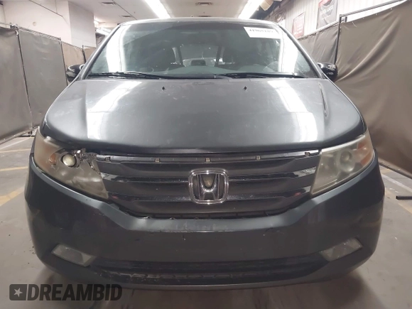 2012 Honda Odyssey Touring с VIN 5FNRL5H99CB047340, выставлен на аукционе IAAI как лот 41965189 с пробегом Не указан миль и . История ставок и продаж доступна на DreamBid. Изображение 12.