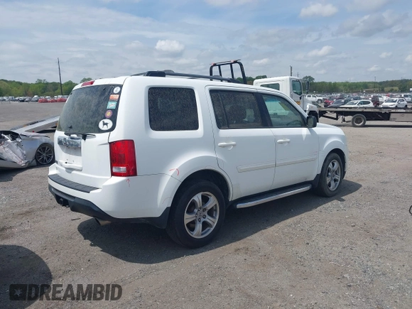 2014 Honda Pilot EX-L with VIN 5FNYF3H50EB005811, listed as a IAAI auction lot 42115804 with 216,033 mi miles and . Bid and sale history available at DreamBid. Image 4.