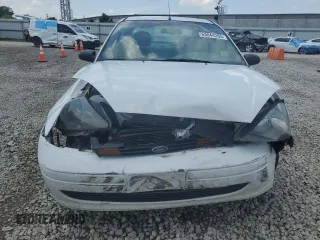 2003 Ford Focus SE with VIN 1FAFP34353W231334, listed as a Copart auction lot 63844205 with 86,601 mi miles and Salvage title. Bid and sale history available at DreamBid. Image 5.
