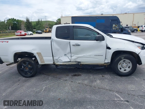 2015 Chevrolet Colorado 4WD WT with VIN 1GCHTAEAXF1204857, listed as a IAAI auction lot 42005800 with 100,378 mi miles and . Bid and sale history available at DreamBid. Image 13.