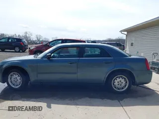 2005 Chrysler 300 with VIN 2C3JA43R45H616682, listed as a IAAI auction lot 41853835 with 158,464 mi miles. Bid and sale history available at carsss.com. Image 14.