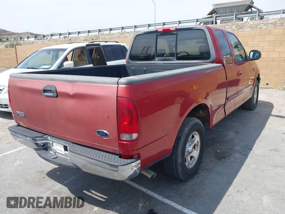 2002 Ford F-150 XL with VIN 1FTRX17LX2NB30978, listed as a IAAI auction lot 41979756 with 225,030 mi miles. Bid and sale history available at carsss.com. Image 4.