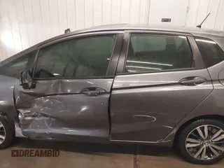2015 Honda Fit EX-L with VIN 3HGGK5H85FM755006, listed as a IAAI auction lot 41034606 with 97,294 mi miles and . Bid and sale history available at DreamBid. Image 14.