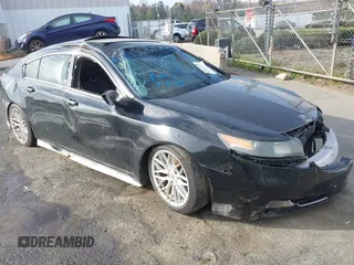 2012 Acura TL Auto z VIN 19UUA8F27CA037245, wystawiony jako IAAI lot #41842980 z przebiegiem 153 750 mil mil oraz . Historia ofert i sprzedaży dostępna na DreamBid. Obrazek 1.