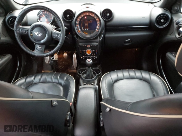 2016 MINI Countryman John Cooper Works with VIN WMWXD1C53GWS95325, listed as a Copart auction lot 77540424 with 98,951 mi miles and Salvage Title. Bid and sale history available at DreamBid. Image 8.