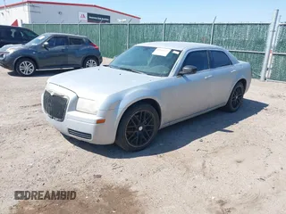 2007 Chrysler 300 with VIN 2C3KA43R67H664434, listed as a IAAI auction lot 41884172 with 238,451 mi miles. Bid and sale history available at carsss.com. Image 2.