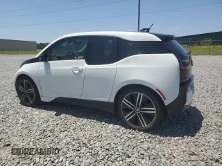 2015 BMW i3 z VIN WBY1Z4C50FV279484, wystawiony jako Copart lot #57398055 z przebiegiem 102 481 mil mil oraz Tytuł czysty. Historia ofert i sprzedaży dostępna na DreamBid. Obrazek 2.