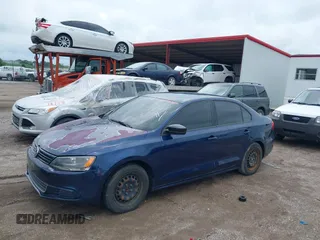2014 Volkswagen Jetta S with VIN 3VW2K7AJ2EM438149, listed as a IAAI auction lot 42594264 with 54,675 mi miles and . Bid and sale history available at DreamBid. Image 12.