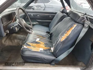 1985 Chevrolet El Camino z VIN 3GCCW80H9FS915947, wystawiony jako Copart lot #84659344 z przebiegiem 38 549 mil mil oraz Szkoda całkowita • Salvage title. Historia ofert i sprzedaży dostępna na DreamBid. Obrazek 7.