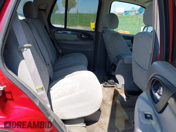 2005 GMC Envoy SLT with VIN 1GKDS13SX52144959, listed as a IAAI auction lot 41968495 with 238,199 mi miles. Bid and sale history available at carsss.com. Image 8.
