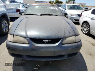 1998 Ford Mustang GT with VIN 1FAFP45X9WF103156, listed as a Copart auction lot 61475414 with 79,714 mi miles and Salvage Title. Bid and sale history available at carsss.com. Image 5.