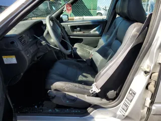 2000 Volvo S70 z VIN YV1LS61J4Y2630471, wystawiony jako Copart lot #72342454 z przebiegiem 167 733 mil mil oraz Nie do naprawy. Historia ofert i sprzedaży dostępna na DreamBid. Obrazek 7.