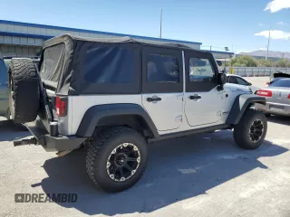 2012 Jeep Wrangler Unlimited Call of Duty MW3 with VIN 1C4BJWFG9CL199551, listed as a Copart auction lot 57097555 with 43,651 mi miles and Salvage title. Bid and sale history available at DreamBid. Image 3.