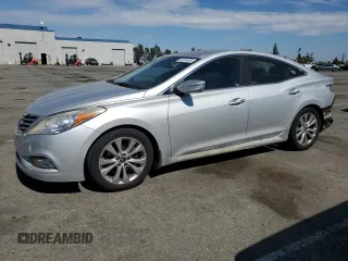 2014 Hyundai Azera Limited z VIN KMHFH4JG9EA418754, wystawiony jako Copart lot #64101695 z przebiegiem 98 647 mil mil oraz Szkoda całkowita • Salvage title. Historia ofert i sprzedaży dostępna na DreamBid. Obrazek 1.