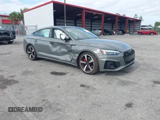 2023 Audi A5 Sportback S line Premium Plus z VIN WAUFACF56PA038023, wystawiony jako IAAI lot #42074137 z przebiegiem 15 998 mil mil oraz . Historia ofert i sprzedaży dostępna na DreamBid. Obrazek 1.