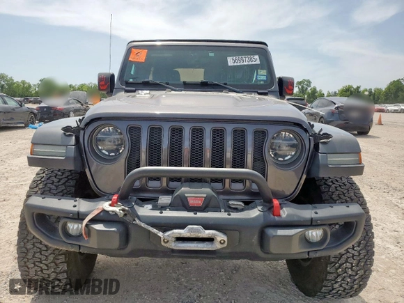 2018 Jeep Wrangler Unlimited Rubicon with VIN 1C4HJXFG6JW166731, listed as a Copart auction lot 56997385 with 117,713 mi miles and Salvage title. Bid and sale history available at DreamBid. Image 5.