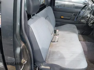 1994 Nissan Frontier z VIN 1N6SD11S2RC402971, wystawiony jako IAAI lot #42388139 z przebiegiem 122 571 mil mil oraz . Historia ofert i sprzedaży dostępna na DreamBid. Obrazek 5.
