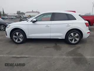 2024 Audi Q5 Premium Plus z VIN WA1BBAFY9R2044435, wystawiony jako IAAI lot #41210271 z przebiegiem 8 906 mil mil oraz . Historia ofert i sprzedaży dostępna na DreamBid. Obrazek 14.