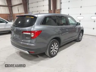 2019 Honda Pilot EX-L with VIN 5FNYF6H51KB099825, listed as a IAAI auction lot 42421688 with 51,370 mi miles and . Bid and sale history available at DreamBid. Image 4.