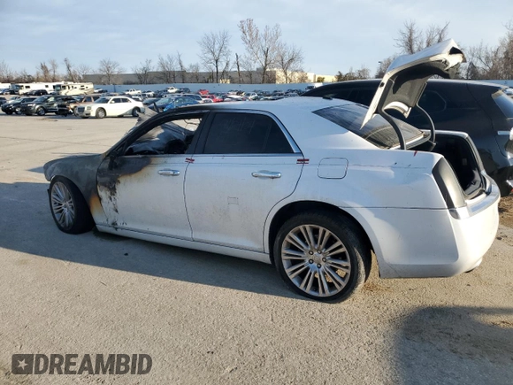 2012 Chrysler 300 C with VIN 2C3CCAKT6CH143430, listed as a Copart auction lot 82998034 with Not Provided miles and Salvage Title. Bid and sale history available at DreamBid. Image 2.