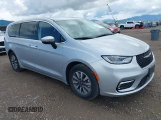 2023 Chrysler Pacifica Hybrid Touring L with VIN 2C4RC1L73PR626350, listed as a IAAI auction lot 42179456 with 41,664 mi miles and . Bid and sale history available at DreamBid. Image 1.