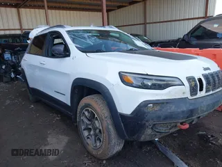 2021 Jeep Cherokee Trailhawk z VIN 1C4PJMBX4MD153086, wystawiony jako IAAI lot #41132030 z przebiegiem 56 367 mil mil oraz . Historia ofert i sprzedaży dostępna na DreamBid. Obrazek 1.