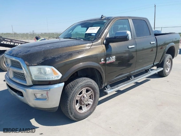 2013 Ram 2500 Laramie with VIN 3C6UR5FL7DG529590, listed as a IAAI auction lot 40608177 with 141,594 mi miles. Bid and sale history available at carsss.com. Image 2.