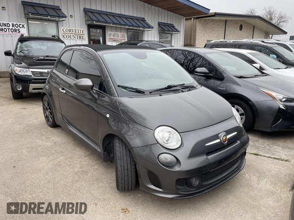 2014 FIAT 500 Abarth with VIN 3C3CFFJH8ET190132, listed as a IAAI auction lot 41574469 with 105,809 mi miles. Bid and sale history available at carsss.com. Image 1.