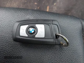 2014 BMW 3 Series 320i xDrive with VIN WBA3C3G59ENS70388, listed as a IAAI auction lot 41962815 with 195,393 mi miles. Bid and sale history available at carsss.com. Image 11.