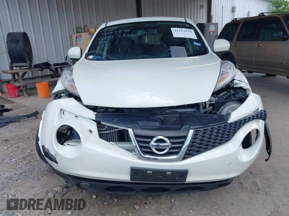 2012 Nissan Juke SL z VIN JN8AF5MVXCT125276, wystawiony jako IAAI lot #42223170 z przebiegiem Nie podano mil oraz . Historia ofert i sprzedaży dostępna na DreamBid. Obrazek 13.