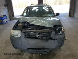 2005 Ford Escape XLS Value with VIN 1FMYU02Z45KB16795, listed as a Copart auction lot 76715344 with 196,424 mi miles and Salvage Title. Bid and sale history available at carsss.com. Image 5.