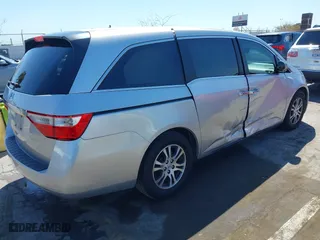 2012 Honda Odyssey EX with VIN 5FNRL5H48CB023003, listed as a IAAI auction lot 41975027 with 221,313 mi miles. Bid and sale history available at carsss.com. Image 4.