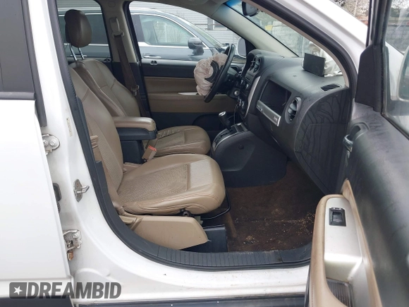 2014 Jeep Compass Latitude with VIN 1C4NJCEB8ED518193, listed as a IAAI auction lot 41957771 with 175,549 mi miles. Bid and sale history available at carsss.com. Image 5.