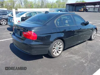2011 BMW 3 Series 328i with VIN WBAPH7G50BNM56021, listed as a IAAI auction lot 42006563 with 178,919 mi miles. Bid and sale history available at carsss.com. Image 4.