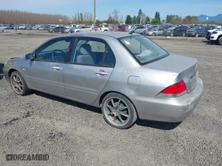 2005 Mitsubishi Lancer ES with VIN JA3AJ26E55U014748, listed as a IAAI auction lot 41935566 with 255,336 mi miles. Bid and sale history available at carsss.com. Image 3.