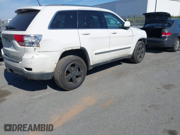 2012 Jeep Grand Cherokee Laredo with VIN 1C4RJFAT4CC229204, listed as a IAAI auction lot 41659491 with 141,143 mi miles. Bid and sale history available at carsss.com. Image 4.