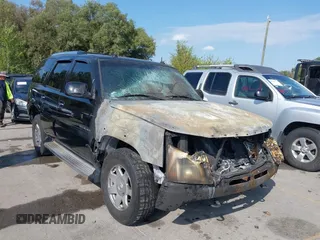 2005 Cadillac Escalade z VIN 1GYEK63N25R105839, wystawiony jako IAAI lot #40391246 z przebiegiem Nie podano mil oraz . Historia ofert i sprzedaży dostępna na DreamBid. Obrazek 1.