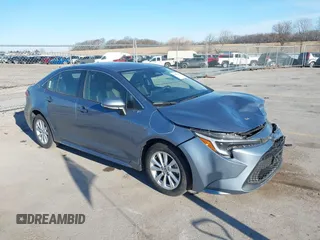 2023 Toyota Corolla Hybrid LE with VIN JTDBCMFEXPJ014034, listed as a IAAI auction lot 41865829 with 33,210 mi miles and . Bid and sale history available at carsss.com. Image 18.