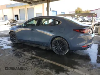 2024 Mazda 3 S Carbon Edition with VIN 3MZBPBCM7RM410798, listed as a Copart auction lot 52444015 with 17,150 mi miles and Non Repairable. Bid and sale history available at DreamBid. Image 2.