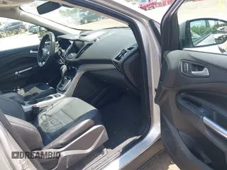 2013 Ford Escape SEL z VIN 1FMCU9H94DUD19842, wystawiony jako IAAI lot #42399577 z przebiegiem 176 257 mil mil oraz . Historia ofert i sprzedaży dostępna na DreamBid. Obrazek 5.