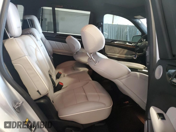 2013 Mercedes-Benz GL 450 z VIN 4JGDF7CE4DA115020, wystawiony jako Copart lot #54309625 z przebiegiem 166 123 mil mil oraz Szkoda całkowita • Salvage title. Historia ofert i sprzedaży dostępna na DreamBid. Obrazek 11.