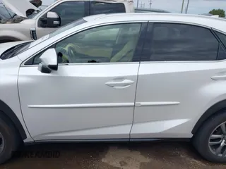 2016 Lexus NX 200t with VIN JTJBARBZ7G2082097, listed as a IAAI auction lot 42596163 with 122,006 mi miles and . Bid and sale history available at DreamBid. Image 14.